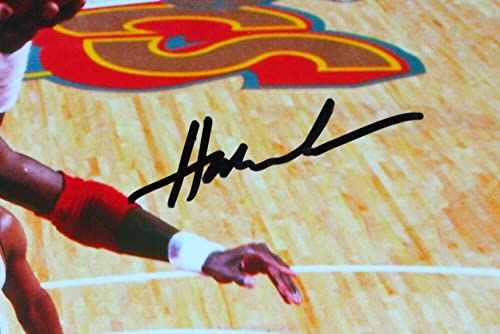 Hakeem Olajuwon Houston Rockets Autographed 16x20 Lay Up Photo- JSA W Black - 757 Sports Collectibles