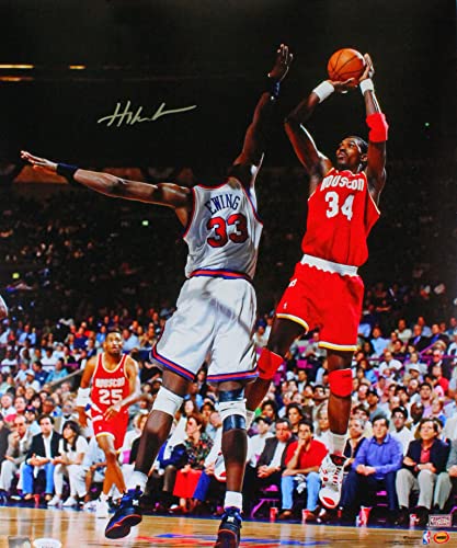 Hakeem Olajuwon Houston Rockets Autographed 16x20 Vs. Ewing Photo- JSA W Silver - 757 Sports Collectibles