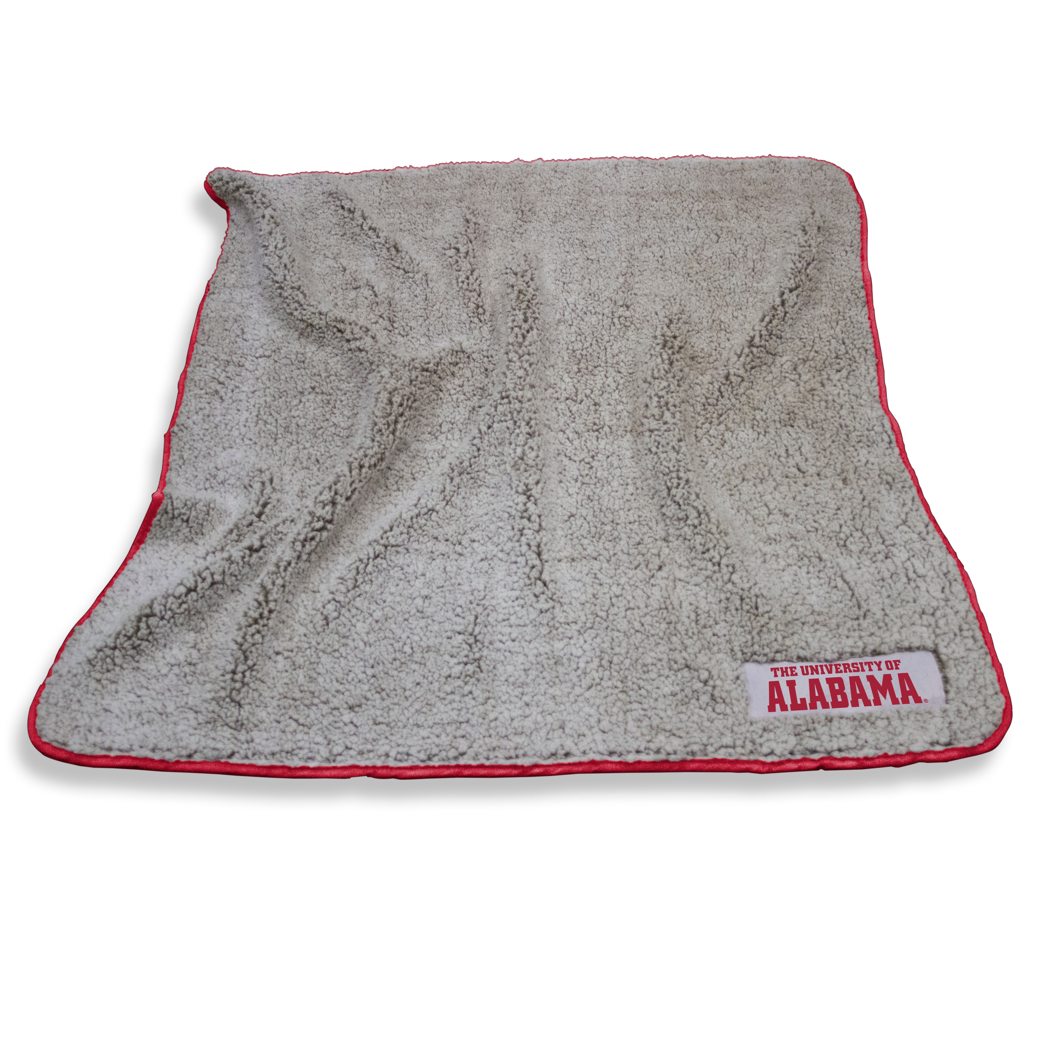 The Alabama Frosty Fleece Throw is a top-selling, cozy blanket made of high-pile sherpa material. It features a team logo, is machine washable, and perfect for various activities. Ideal for gifting, it measures 50x60 and comes with a lifetime guarantee.