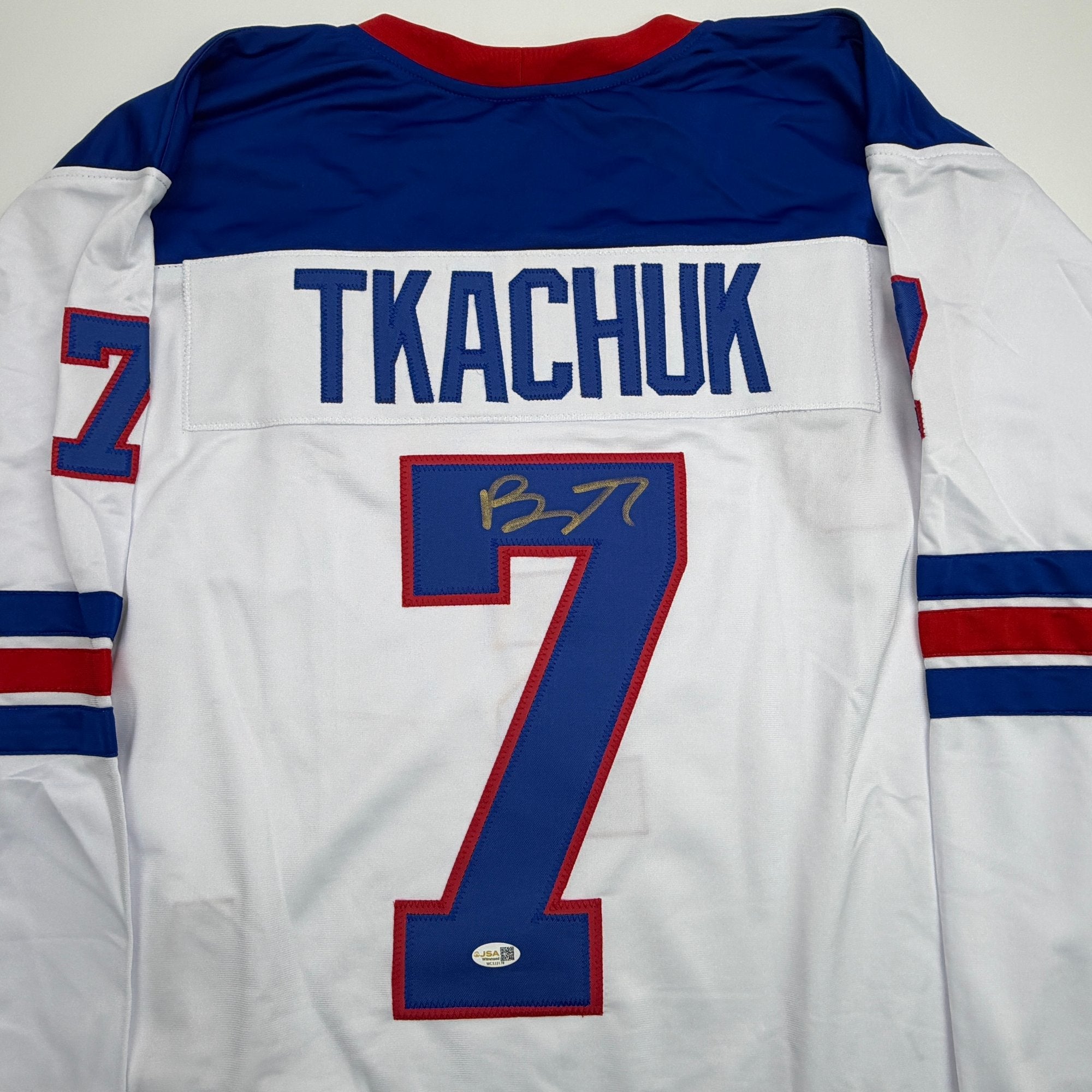 Autographed/Signed Brady Tkachuk USA United States 2026 Olympics Gold Medal White Hockey Jersey JSA COA