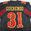 Autographed/Signed Isaac Guerendo San Francisco Black Rivalries Collection Football Jersey Beckett BAS COA