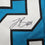 Framed Autographed/Signed Jonathon Brooks 35x39 Carolina Blue Football Jersey JSA COA