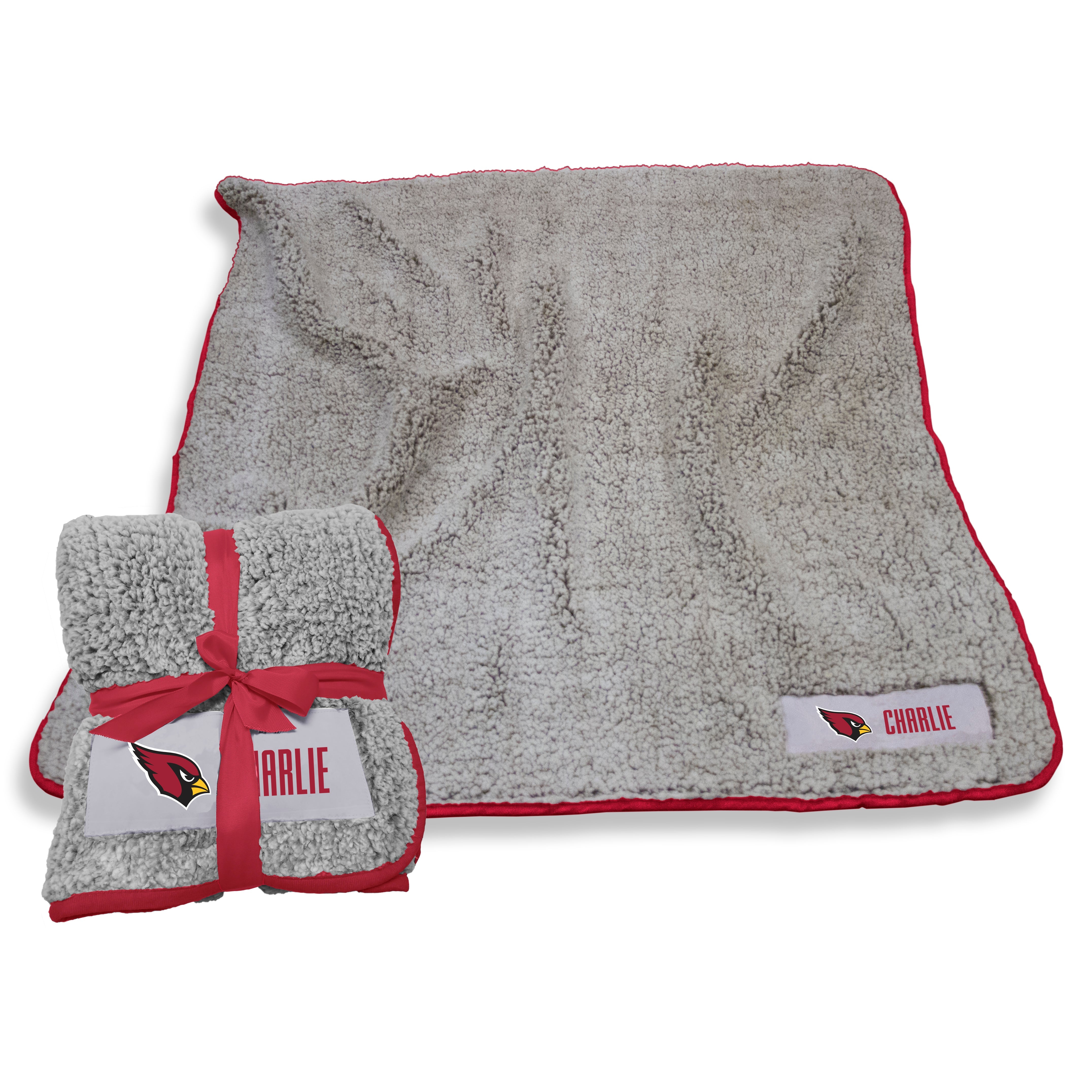 Arizona Cardinals Personalized Frosty Fleece Throw blanket, crafted from luxurious high-pile sherpa material for ultimate warmth and comfort, perfect for game day, tailgating, or cozy nights at home. Features a stylish twill patch with team logo and vibrant trim, measuring 50x60 inches. Ideal for dorms, travel, and camping, machine washable for easy care, and makes a great gift for sports fans.