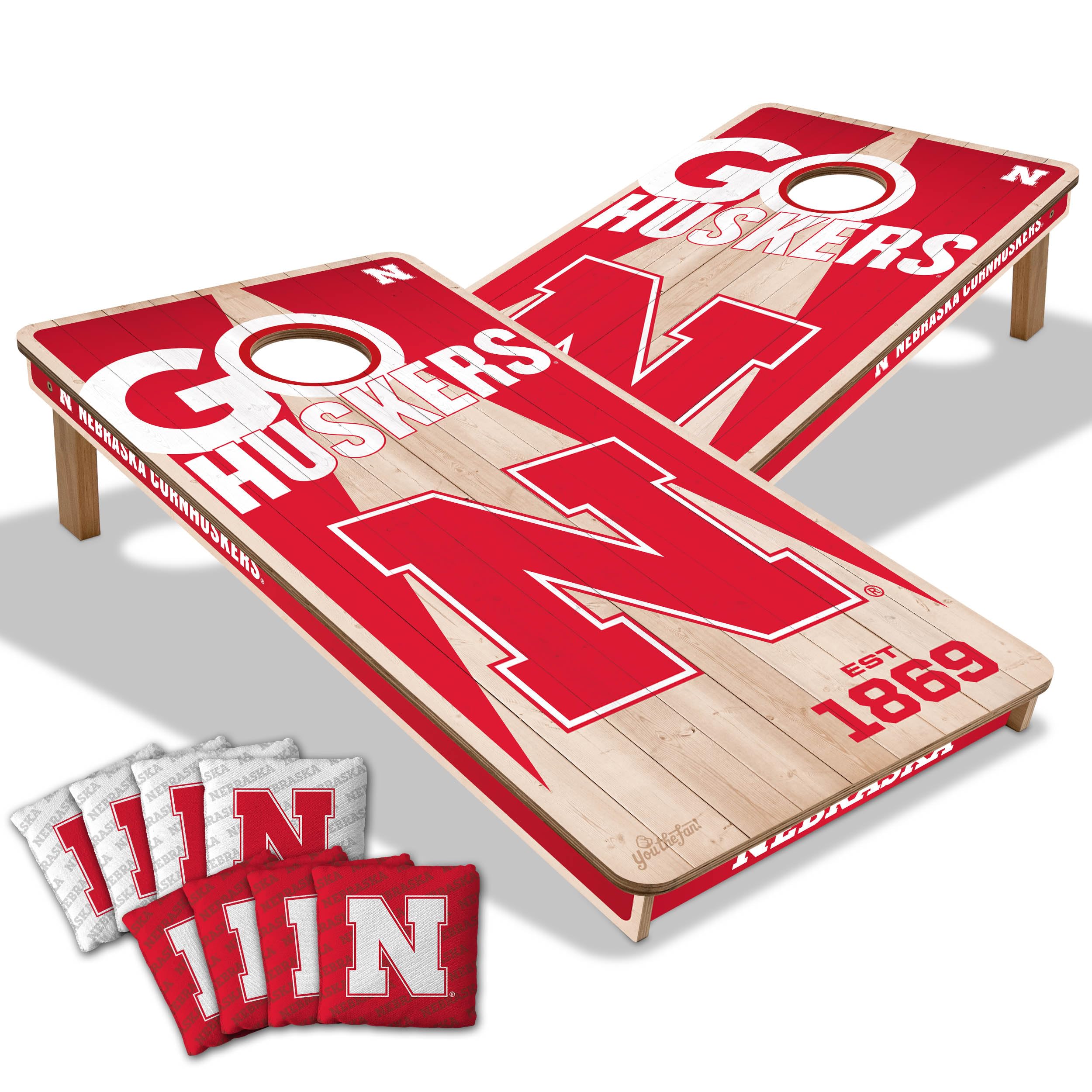 YouTheFan NCAA Nebraska Cornhuskers 2’ x 4’ Professional Wood Cornhole Game with Logo Bags - Sports Collectibles, Sports Memorabilia, Sports Fan Shop, Sports Gifts