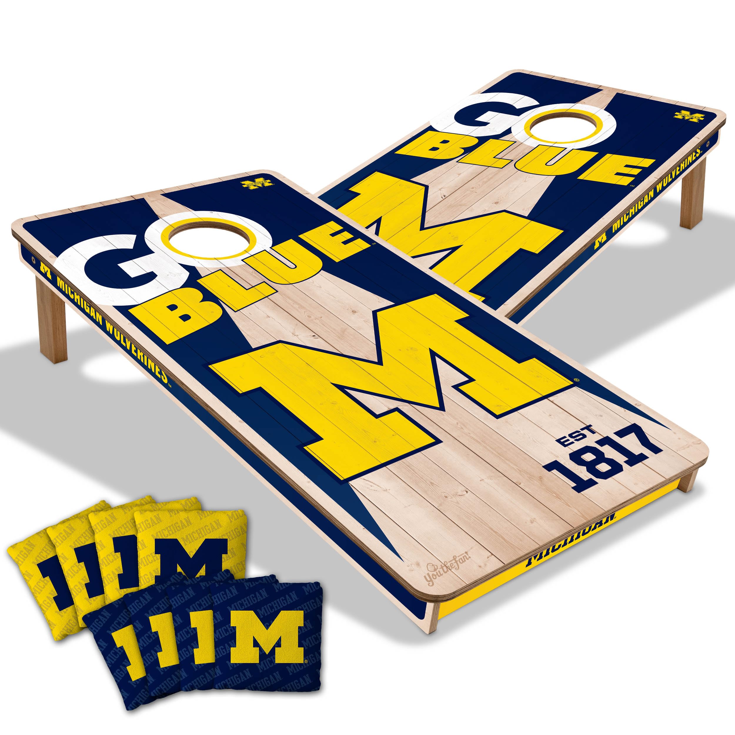 YouTheFan NCAA Michigan Wolverines 2’ x 4’ Professional Wood Cornhole Game with Logo Bags - Sports Collectibles, Sports Memorabilia, Sports Fan Shop, Sports Gifts