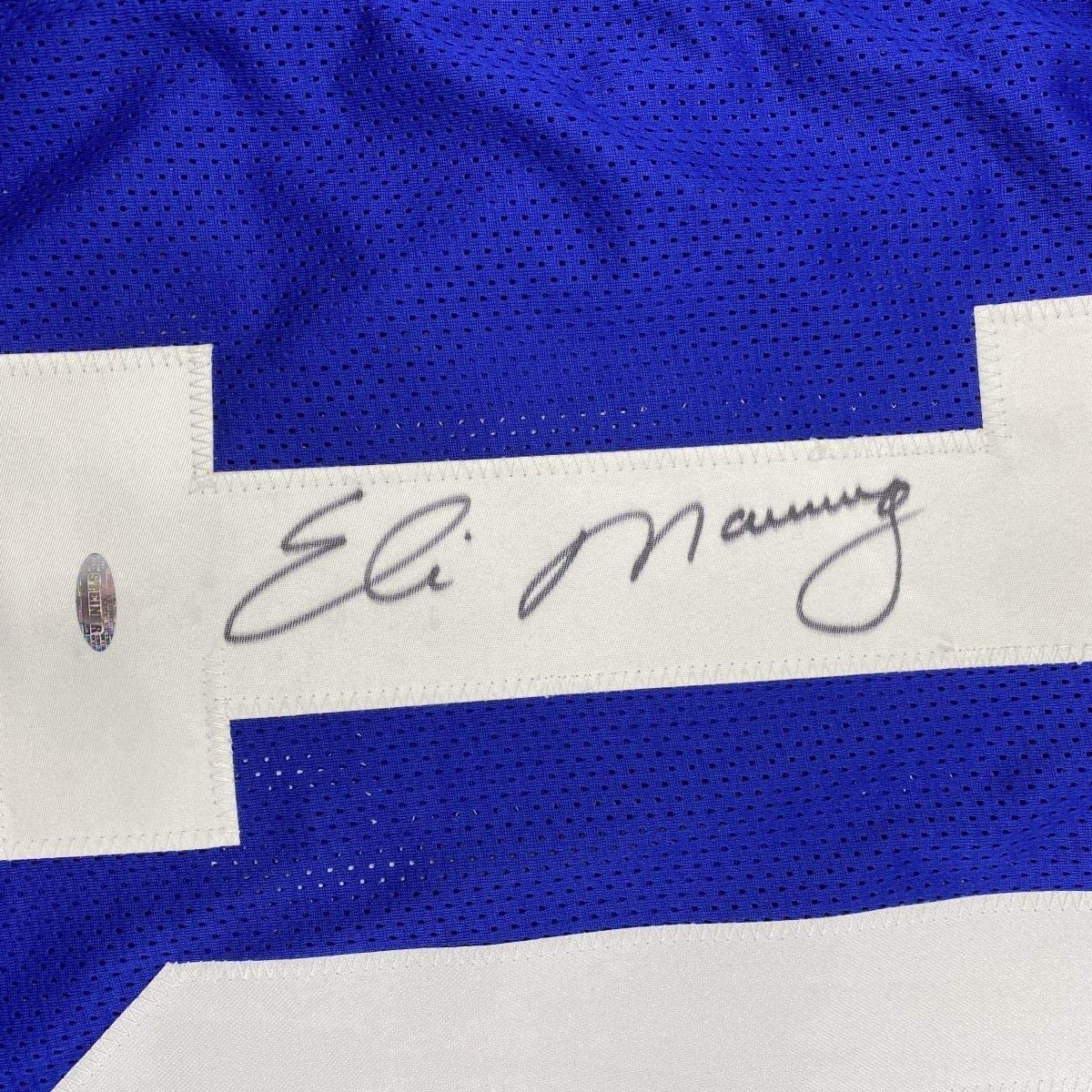 Framed Autographed/Signed Eli Manning 35x39 New York Blue Football Jersey Steiner Sports COA Hologram Only
