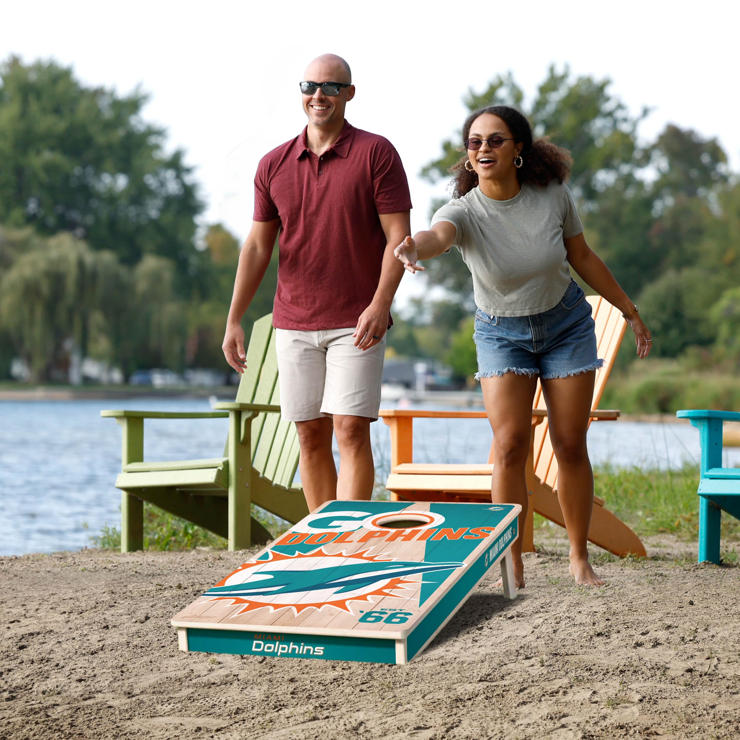 YouTheFan NFL Miami Dolphins 2’ x 4’ Professional Wood Cornhole Game with Logo Bags - Sports Collectibles, Sports Memorabilia, Sports Fan Shop, Sports Gifts