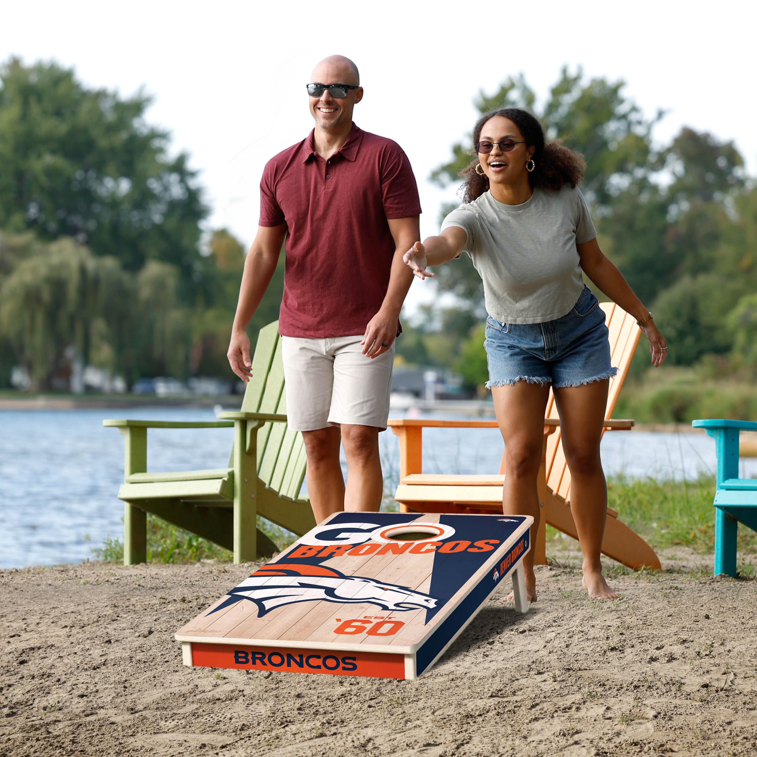YouTheFan NFL Denver Broncos 2’ x 4’ Professional Wood Cornhole Game with Logo Bags - Sports Collectibles, Sports Memorabilia, Sports Fan Shop, Sports Gifts