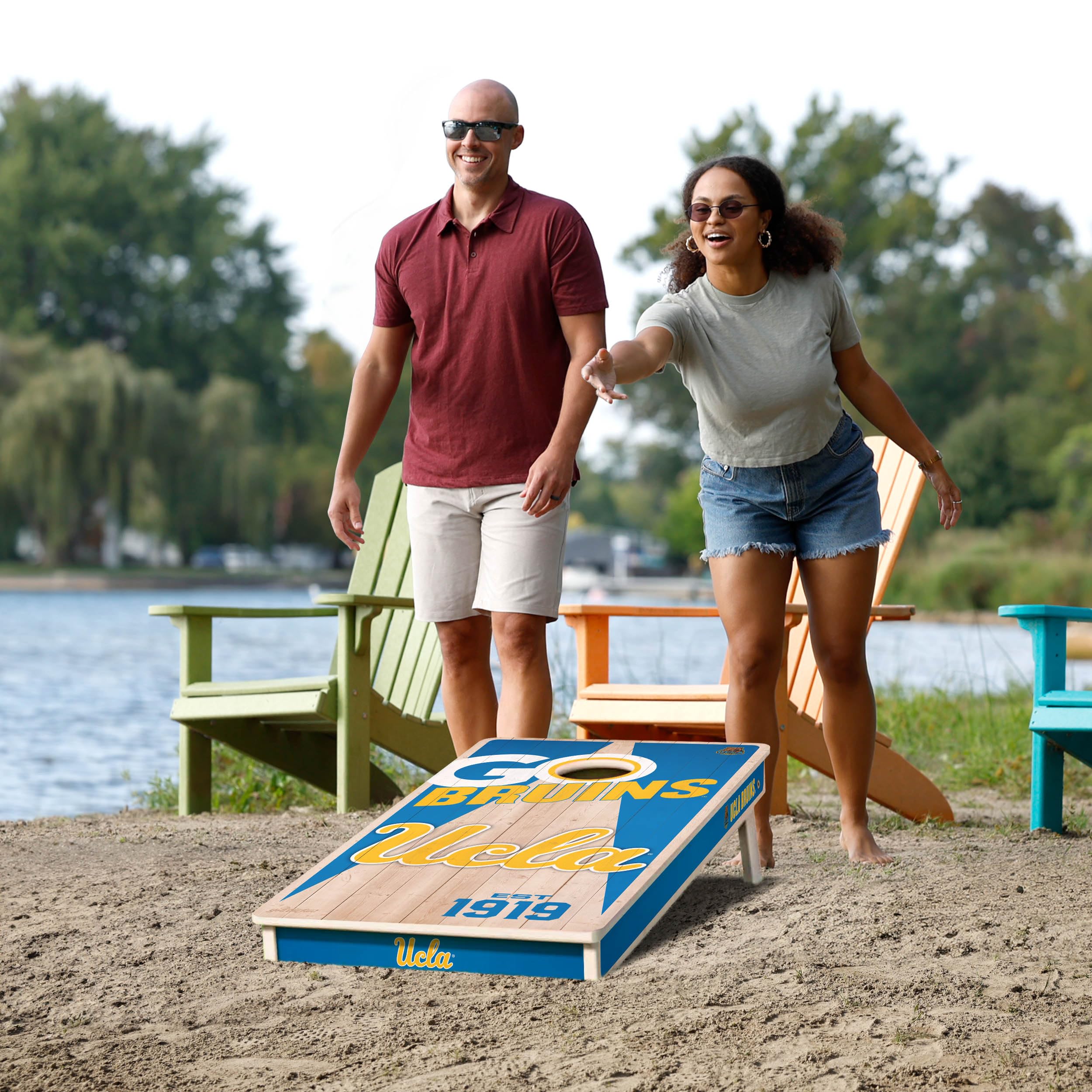 YouTheFan NCAA UCLA Bruins 2’ x 4’ Professional Wood Cornhole Game with Logo Bags - Sports Collectibles, Sports Memorabilia, Sports Fan Shop, Sports Gifts