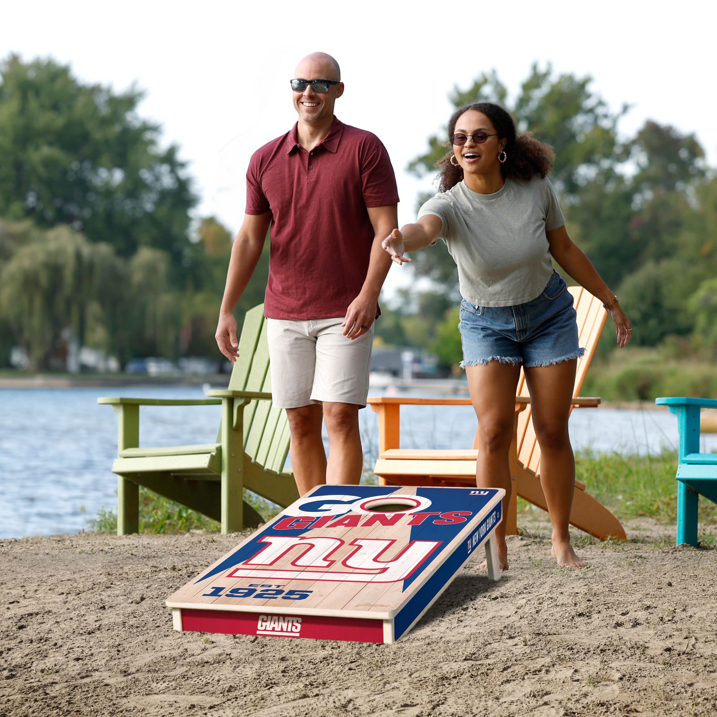 YouTheFan NFL New York Giants 2’ x 4’ Professional Wood Cornhole Game with Logo Bags - Sports Collectibles, Sports Memorabilia, Sports Fan Shop, Sports Gifts