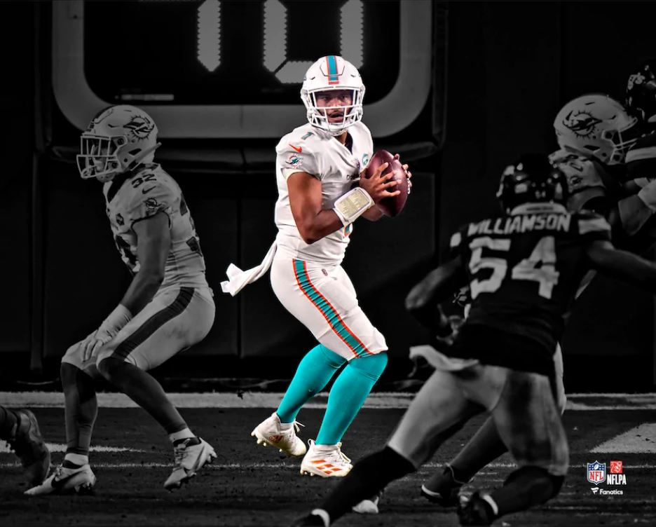 Tua Tagovailoa in Action Miami Dolphins 8" x 10" Blackout Football Photo - Sports Collectibles, Sports Memorabilia, Sports Fan Shop, Sports Gifts