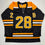Autographed/Signed Elias Lindholm Boston Black Hockey Jersey JSA COA