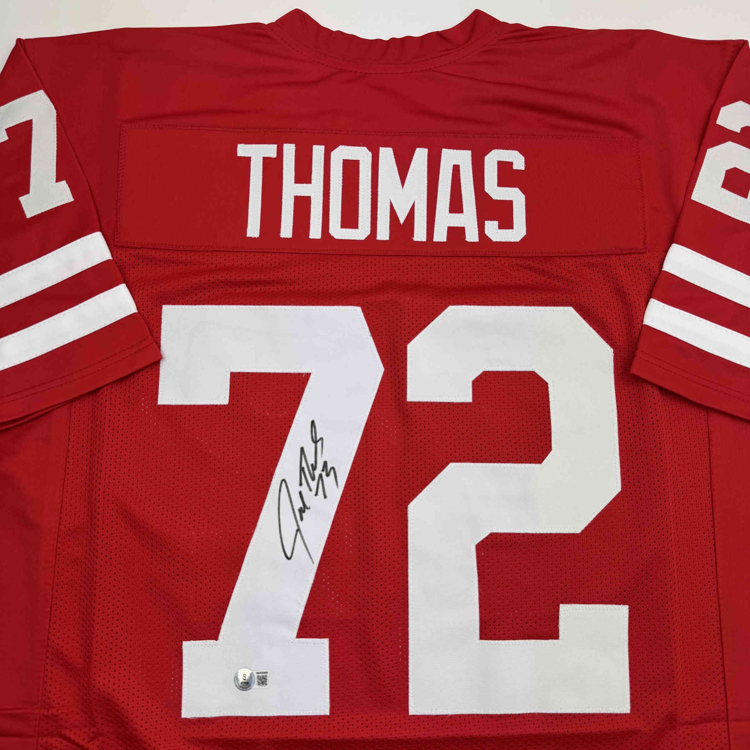 Autographed/Signed Joe Thomas Wisconsin Red College Football Jersey Beckett BAS COA