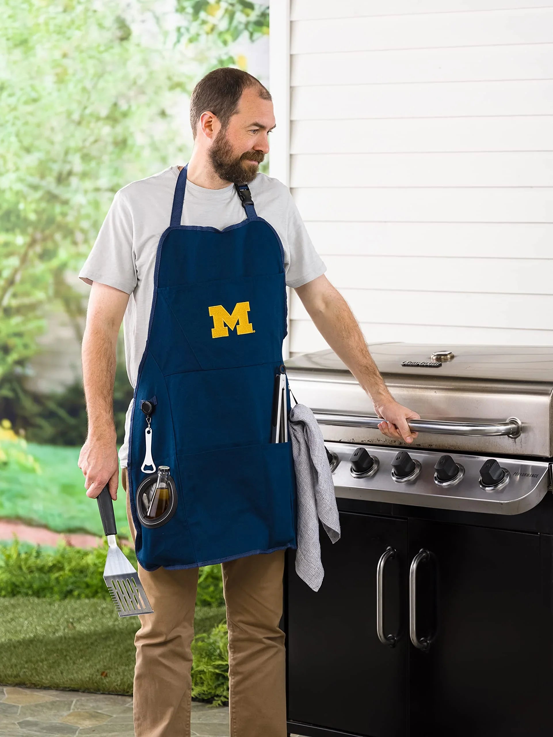 Team Sports America Collegiate University Of Michigan Ultimate Grilling Apron Durable Cotton with Beverage Opener and Multi Tool For Football Fans Fathers Day and More - 757 Sports Collectibles