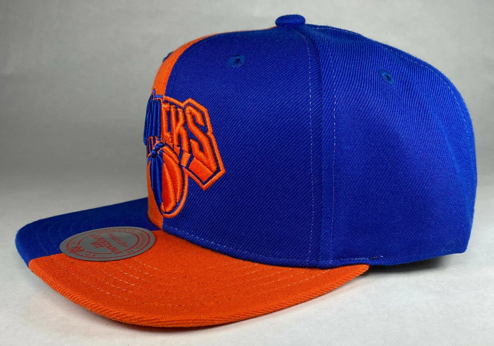Mitchell and Ness NBA New York Knicks 4 Way Split Snapback Hat, Cap, New