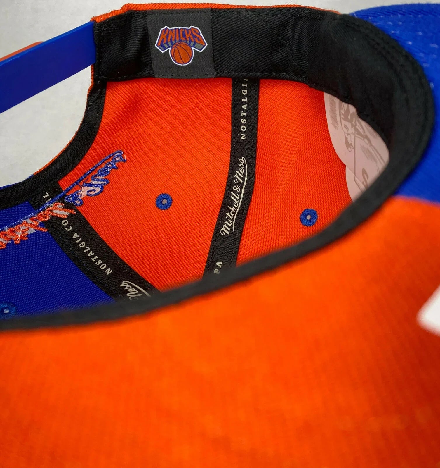 Mitchell and Ness NBA New York Knicks 4 Way Split Snapback Hat, Cap, New